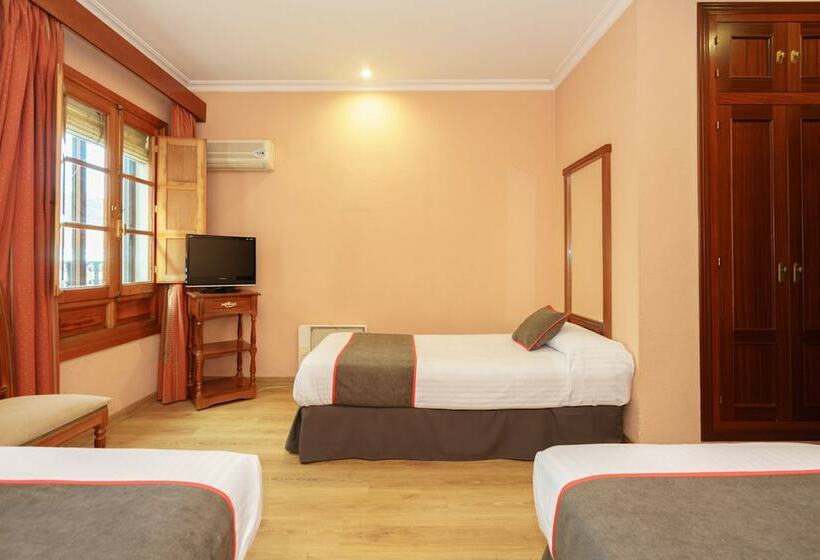 标准三人间, Los Castaños