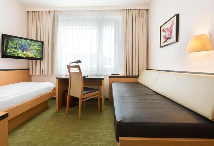 이코노미 룸, City