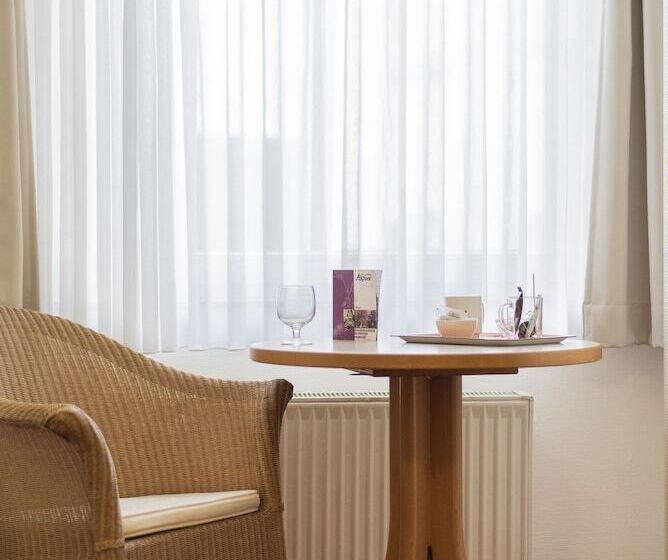 חדר סטנדרט יחיד, Aigner