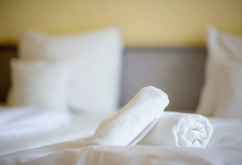 Номер Стандарт, Kapos