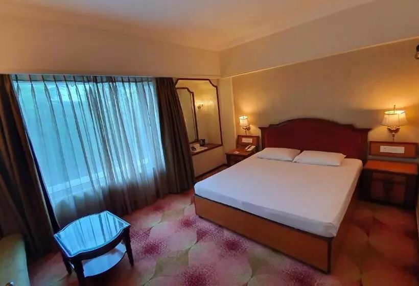 キングサイズベッドのデラックスルーム, Pride Hotel Pune