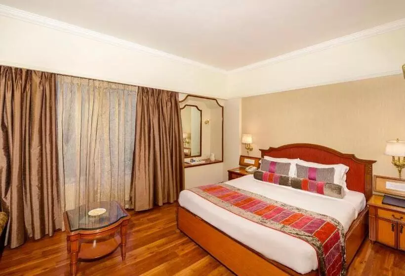 キングサイズベッドのデラックスルーム, Pride Hotel Pune