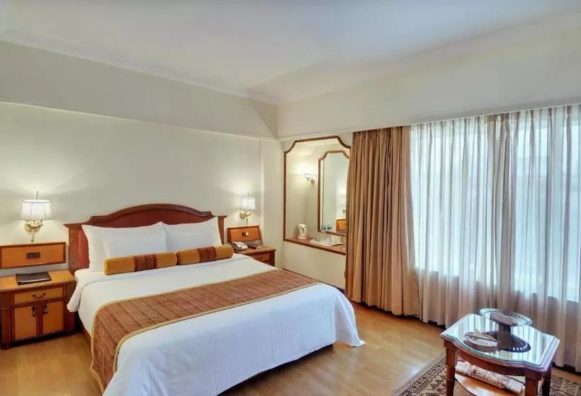 キングサイズベッドのデラックスルーム, Pride Hotel Pune