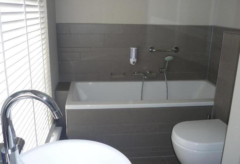 חדר דופלקס, In Den Verdwaalde Koogel