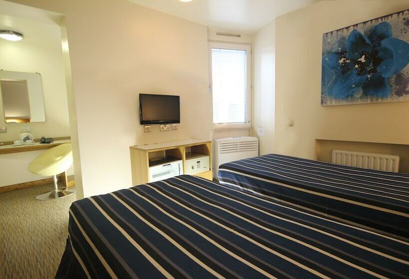 Номер Стандарт, St Giles London – A St Giles