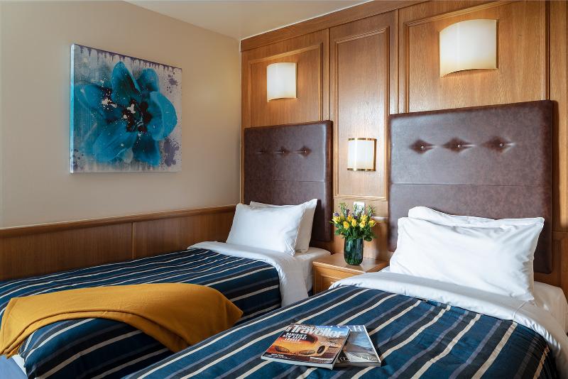 Номер Стандарт, St Giles London – A St Giles