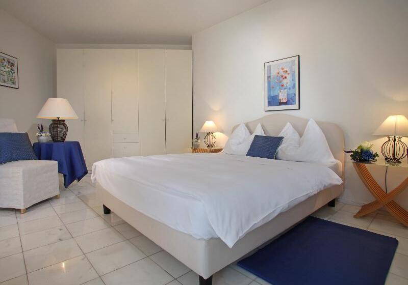 Suite with lake view, Villa Sassa