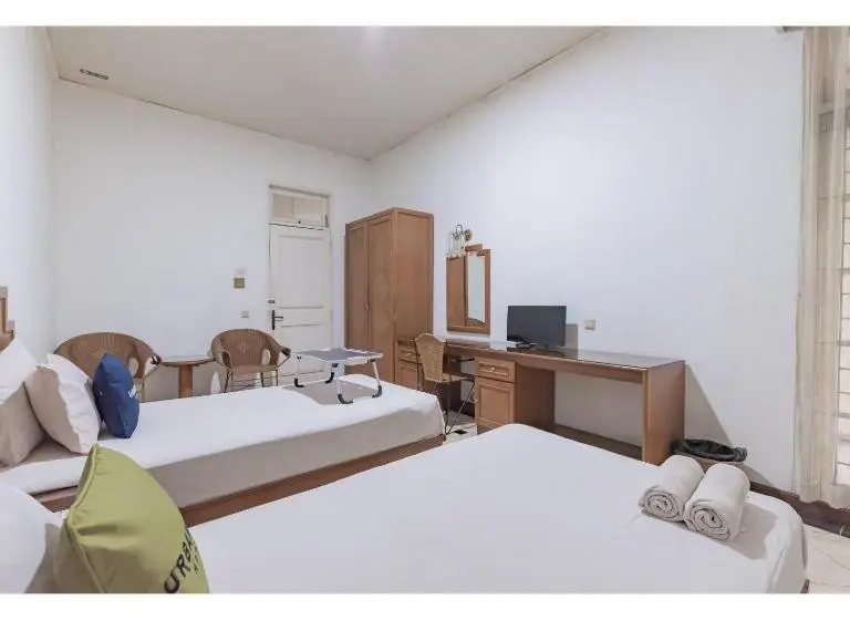 Quarto Deluxe, Urbanview Hotel Utari