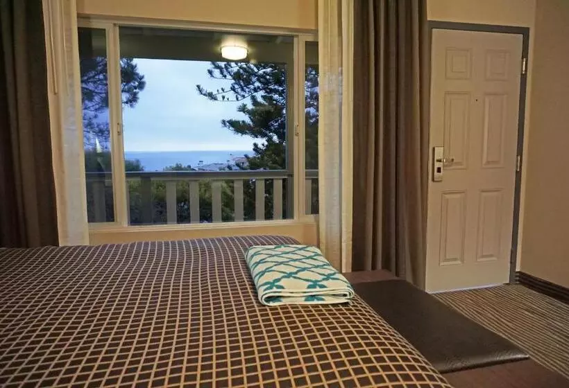 キングサイズベッドのデラックスルーム, Crescent Bay Inn
