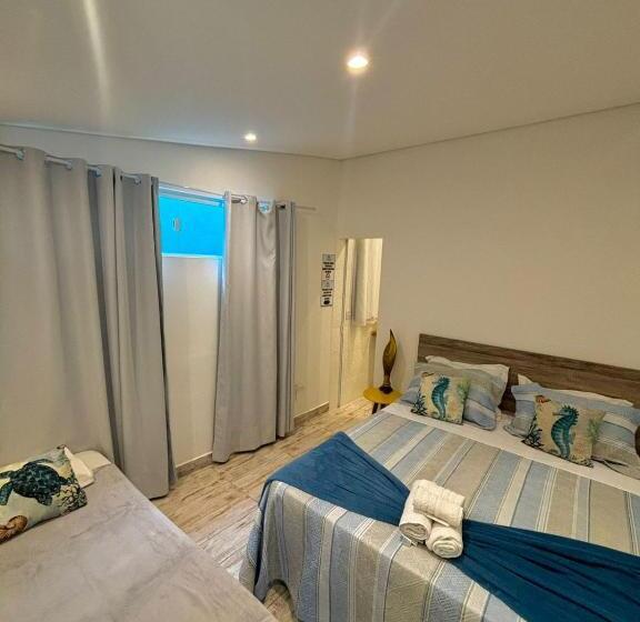 舒适三人间, Pousada Orquídeas Do Guarujá