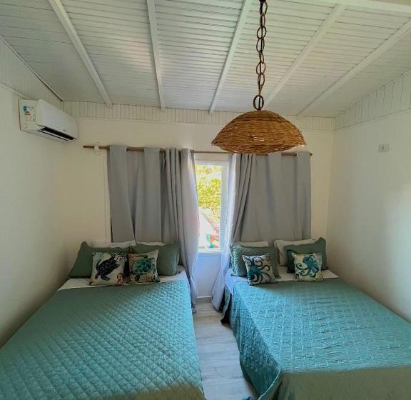 四人高级间, Pousada Orquídeas Do Guarujá