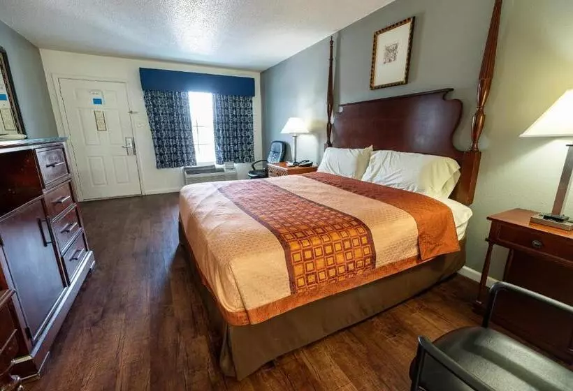 キングサイズベッドのスタンダードルーム, American Inn & Suites Russellville