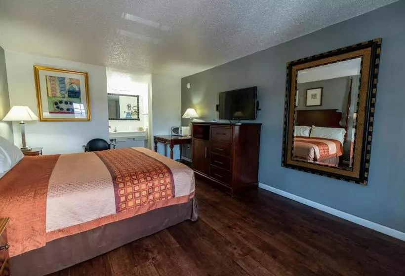 キングサイズベッドのスタンダードルーム, American Inn & Suites Russellville