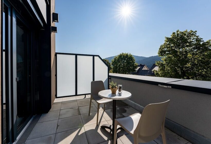 Quarto deluxe, Coucou Hotel & Kuckucks Stube