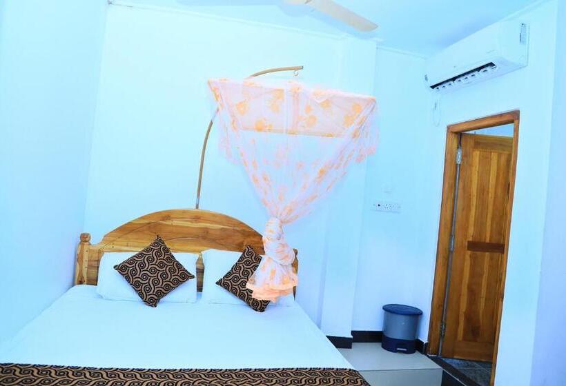 Perhehuone, Sunraay Beach Inn