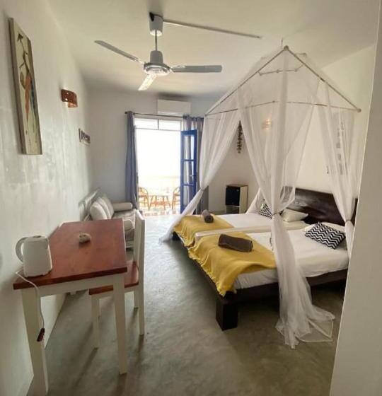 اتاق لوکس با چشمانداز دریا, Nos Kasa