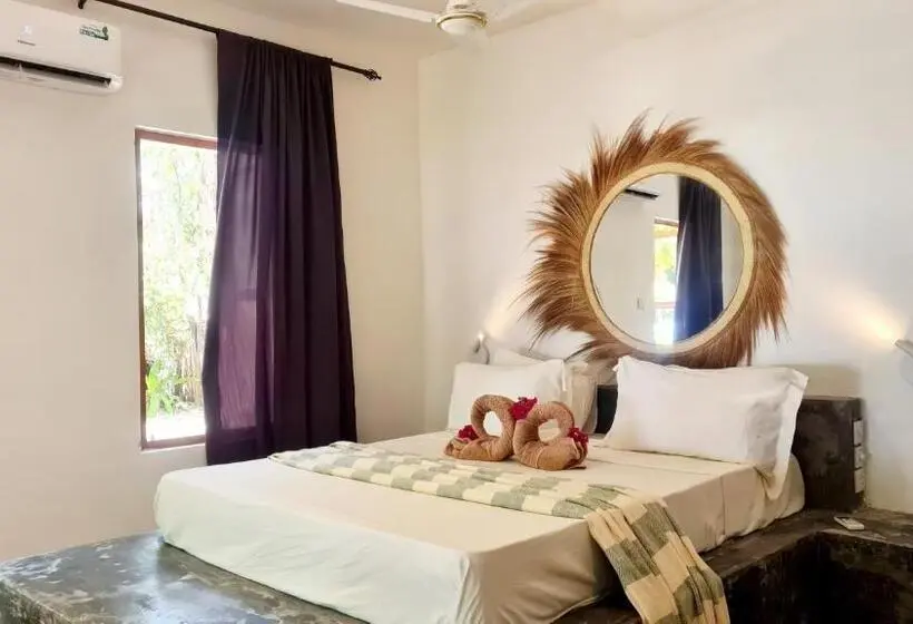 片側に海が見えるデラックスルーム, Garden Beach Bungalows Jambiani