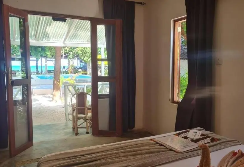 片側に海が見えるデラックスルーム, Garden Beach Bungalows Jambiani