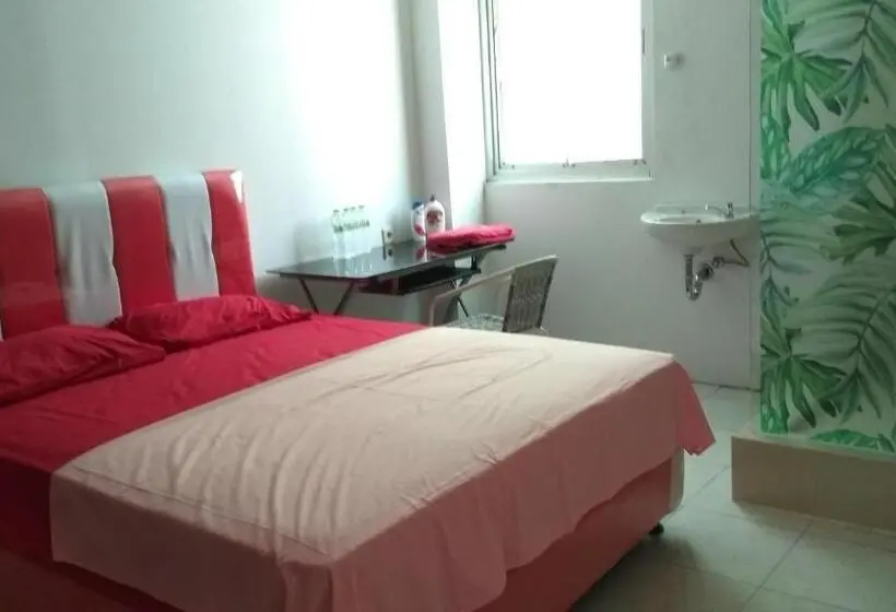Habitació Quàdruple Deluxe, Uni Inn Semarang Gunung Pati