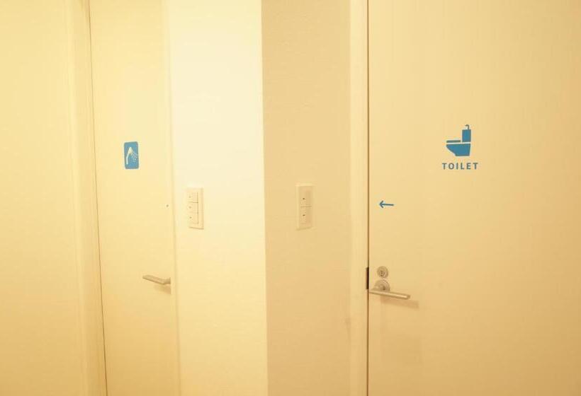 سرير فى غرفة مشتركه, Bnb+atami Resort