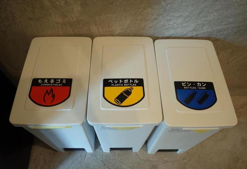 سرير فى غرفة مشتركه, Bnb+atami Resort