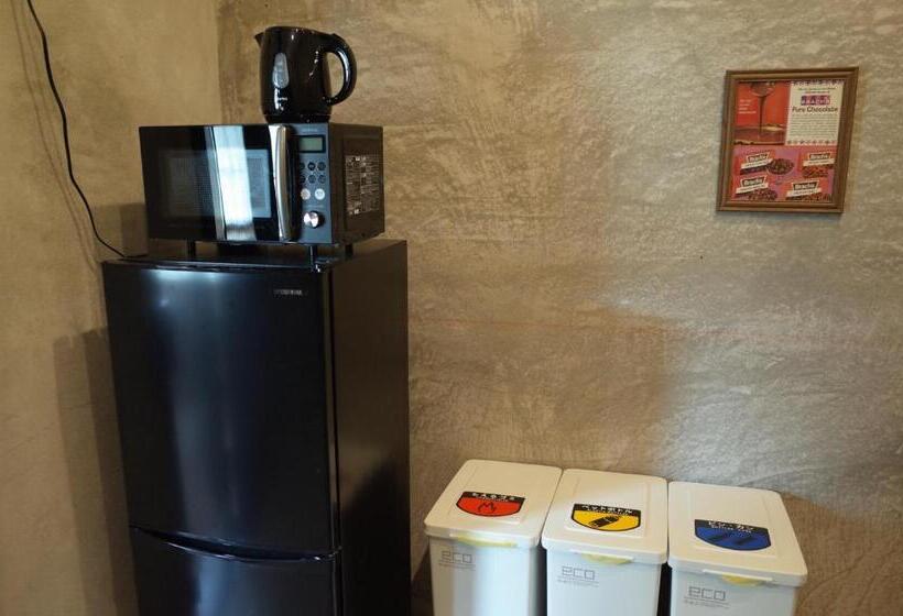 سرير فى غرفة مشتركه, Bnb+atami Resort