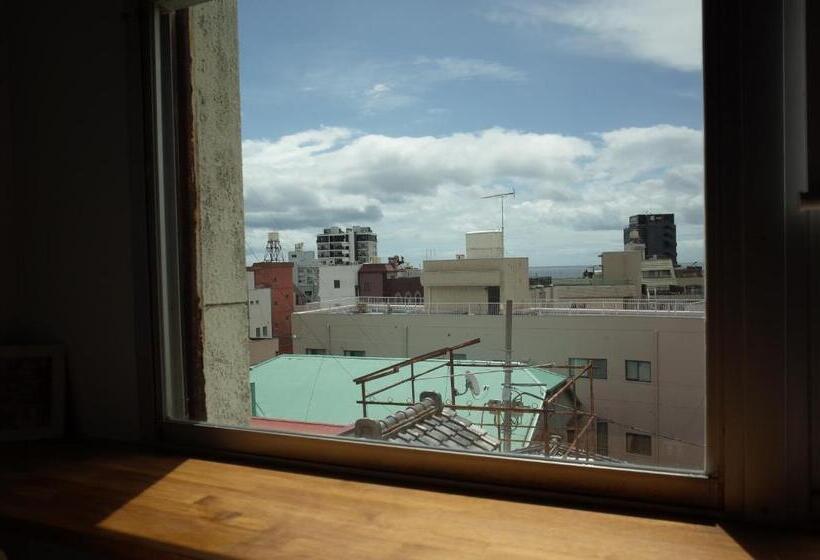 سرير فى غرفة مشتركه, Bnb+atami Resort