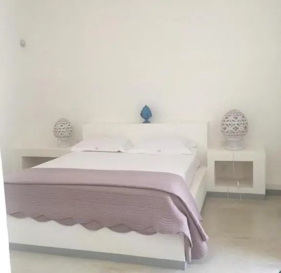 庭の見えるスタンダードトリプルルーム, Masseria Spesseto