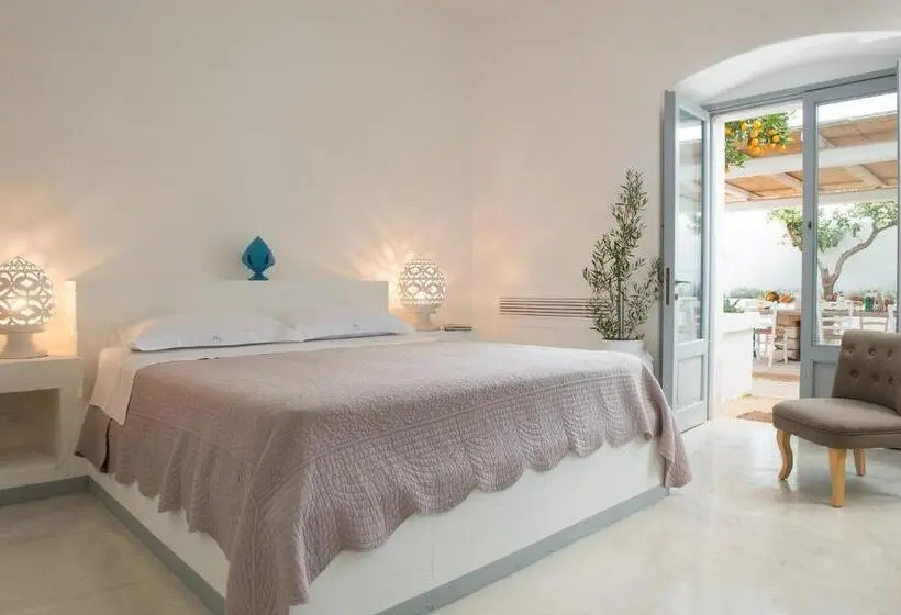 庭の見えるスタンダードトリプルルーム, Masseria Spesseto