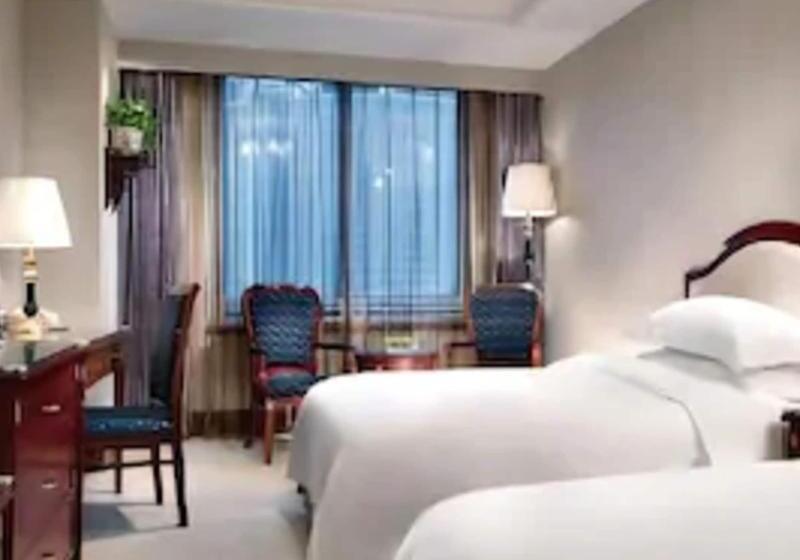 Номер Deluxe, Ramada Plaza Tianlu