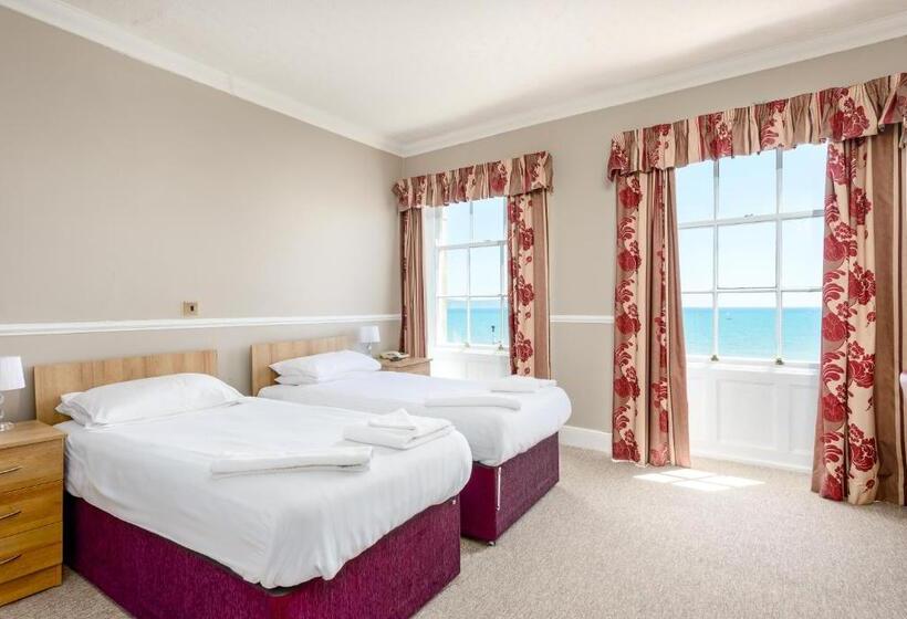 غرفة قياسية مطلّة علي البحر, Russell