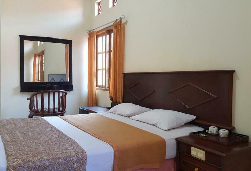 חדר דחוקס עם מיטת קינג, Putri Duyung Guest House