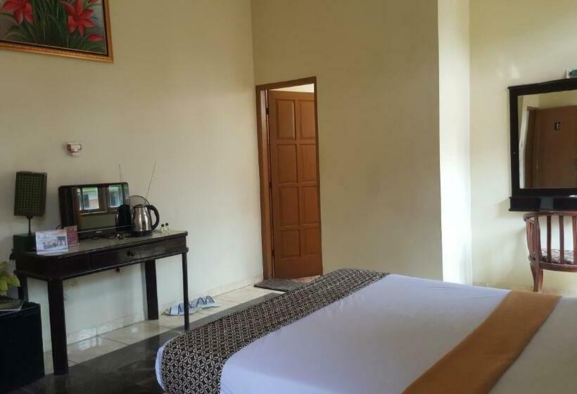 חדר דחוקס עם מיטת קינג, Putri Duyung Guest House