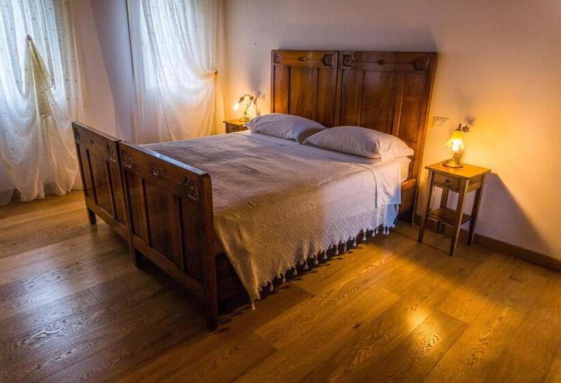 חדר סטנדרט לשלושה עם טרסה, Agriturismo Dai Gobbi