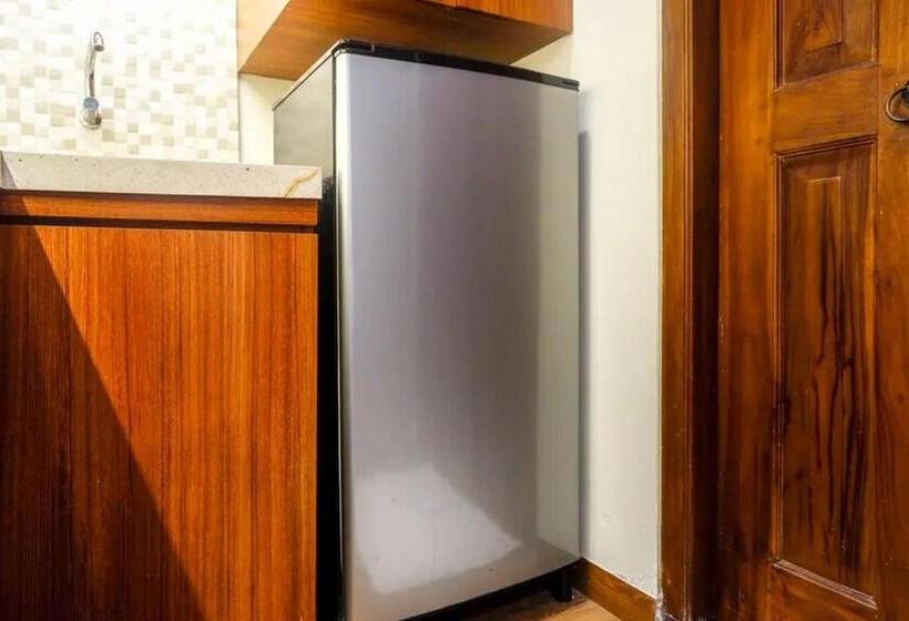 Номер Deluxe, Urbanview Rumah Kandjani Yogyakarta