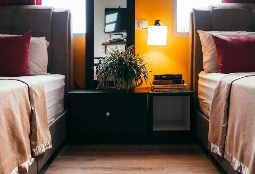 غرفة عائلية, Sura Inn