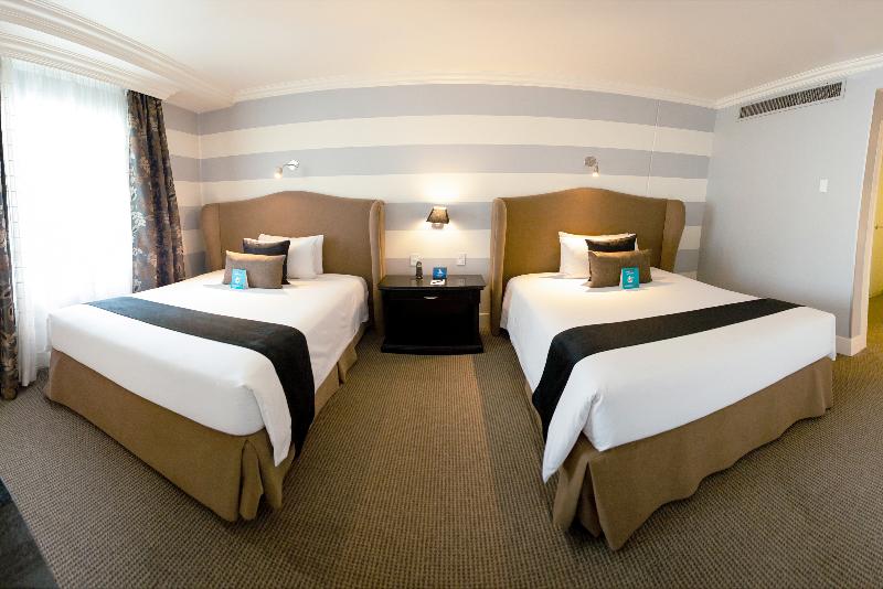 スイート, Dann Carlton Quito