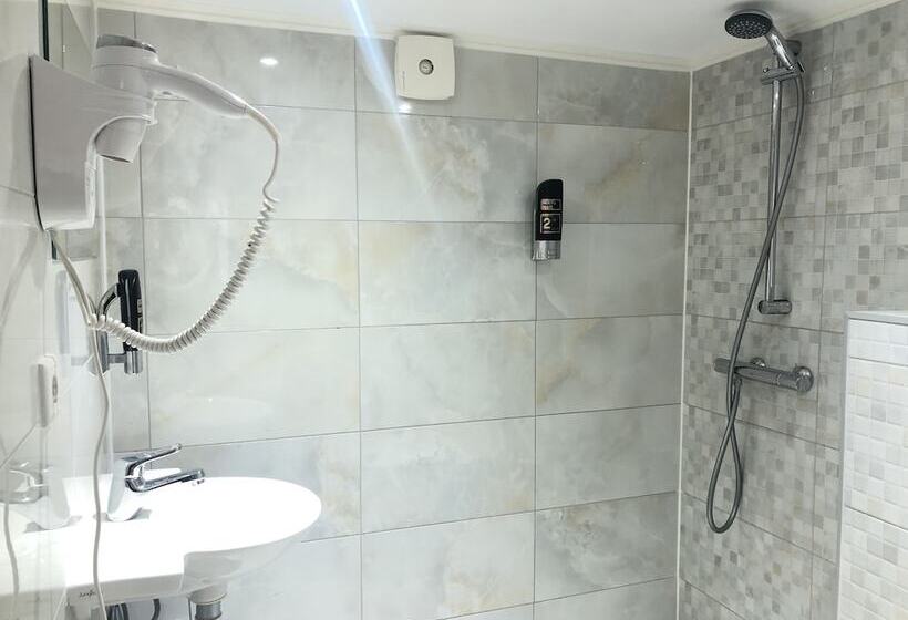 Habitació Quàdruple Estàndard, Damrak Inn