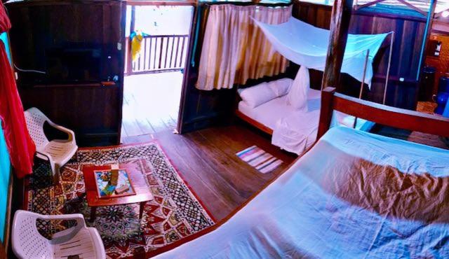 اتاق کلاسیک چهارنفره, Bungalow In The Jungle  Ecolodge Huitoto