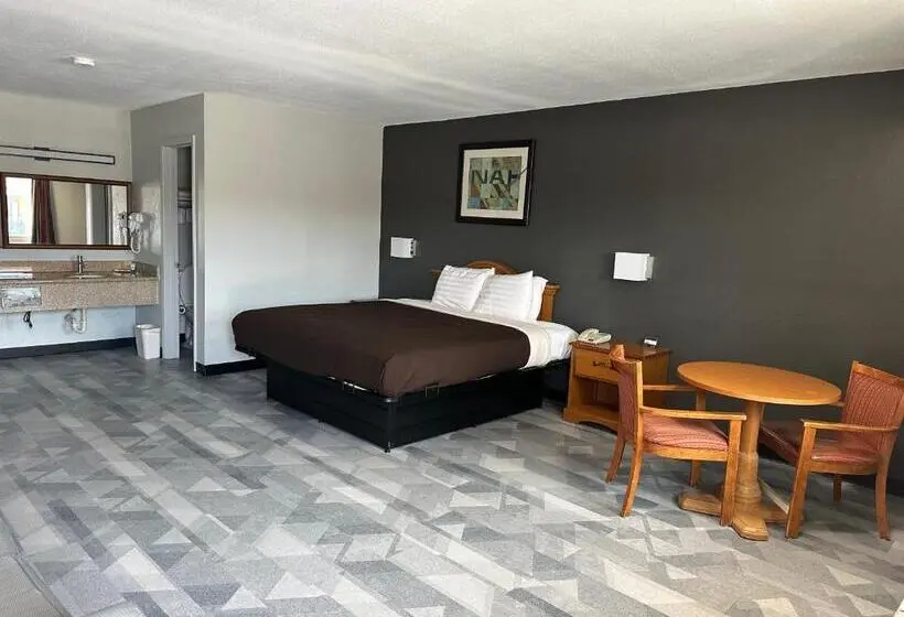 キングサイズベッドのスタンダードルーム, Freer Executive Inn And Studios