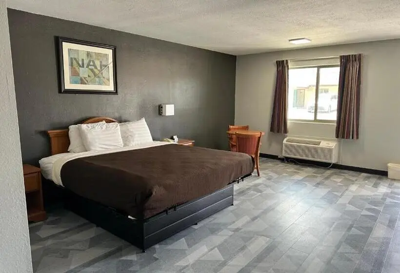 キングサイズベッドのスタンダードルーム, Freer Executive Inn And Studios