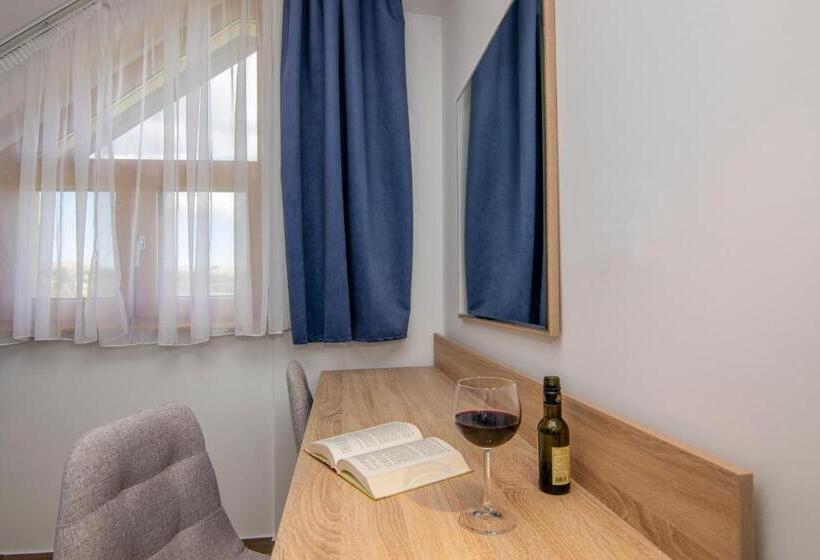 غرفة إقتصادية, Agape