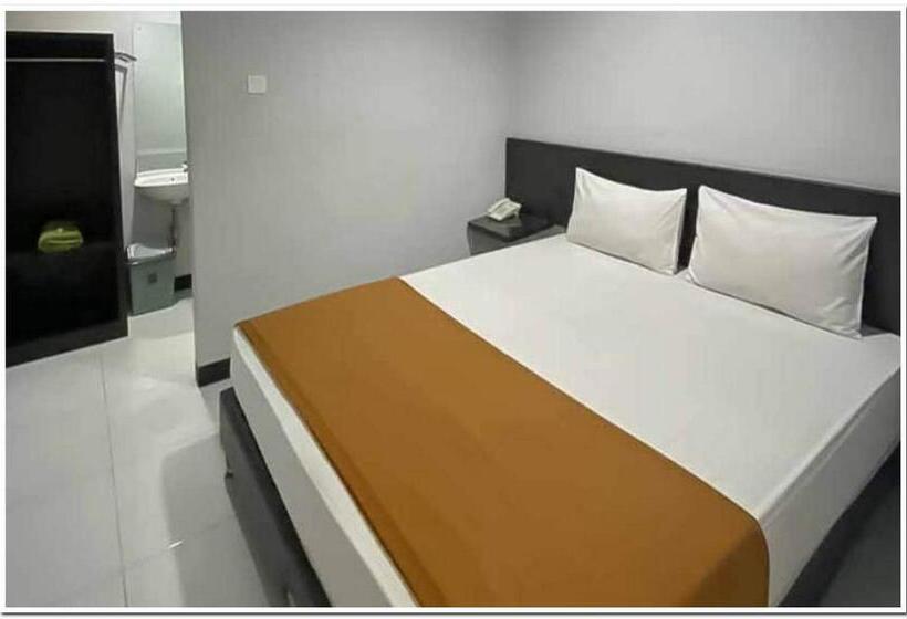 Номер Economy, Losmen Family Syariah Bypass Juanda Mitra Reddoorz