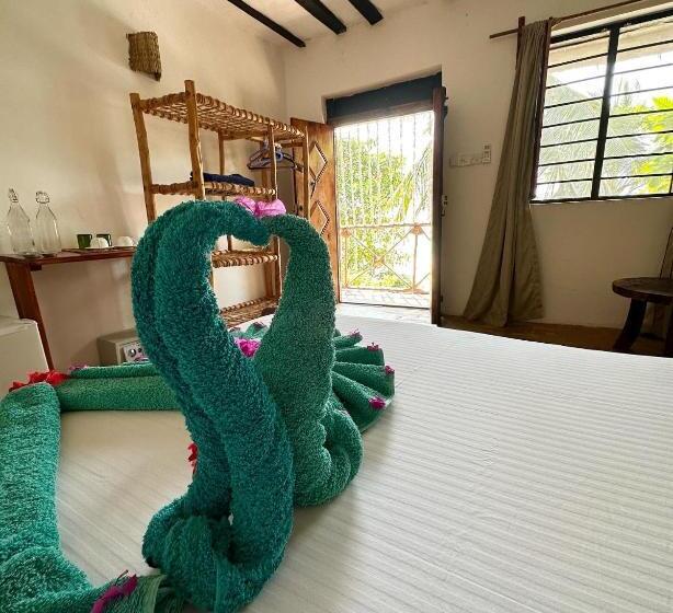 غرفة ديلوكس مطلّة علي البحر مزوَّدة بشُرفة, Hebe Bungalows Lodge