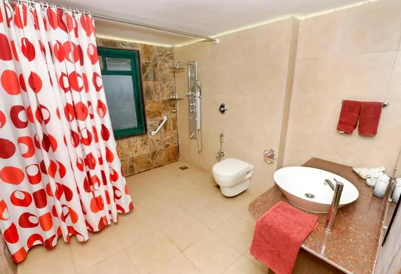 キングサイズベッドのスタンダードルーム, Chira Meadows Ecoresort, Dapoli