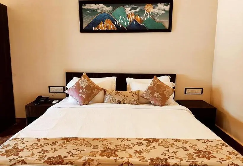 キングサイズベッドのスタンダードルーム, Chira Meadows Ecoresort, Dapoli