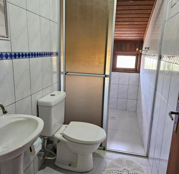 اتاق سه نفره دلوکس با چشم‌انداز دریا, Pousada Capricórnio