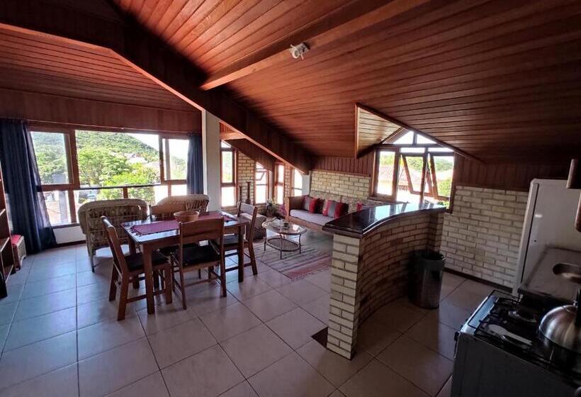 اتاق سه نفره دلوکس با چشم‌انداز دریا, Pousada Capricórnio