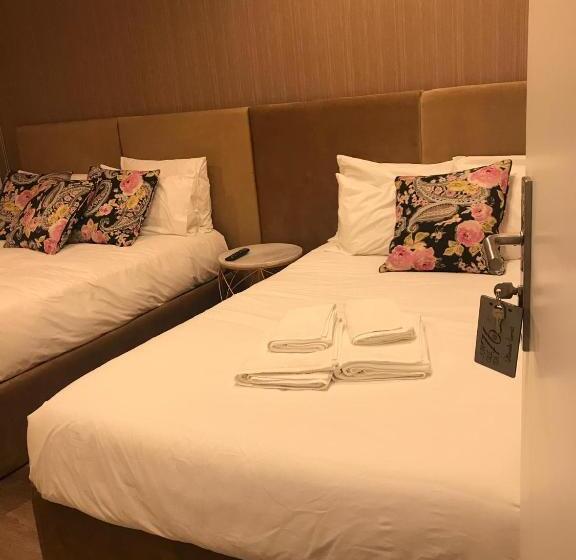 חדר סטנדרטי לארבעה עם חדר אמבטיה משותף, Junqueira76 Guesthouse