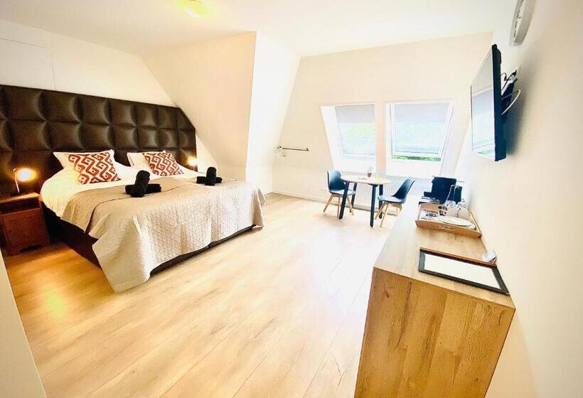 キングサイズベッドのデラックススイート, The Island Life Texel   Wellness